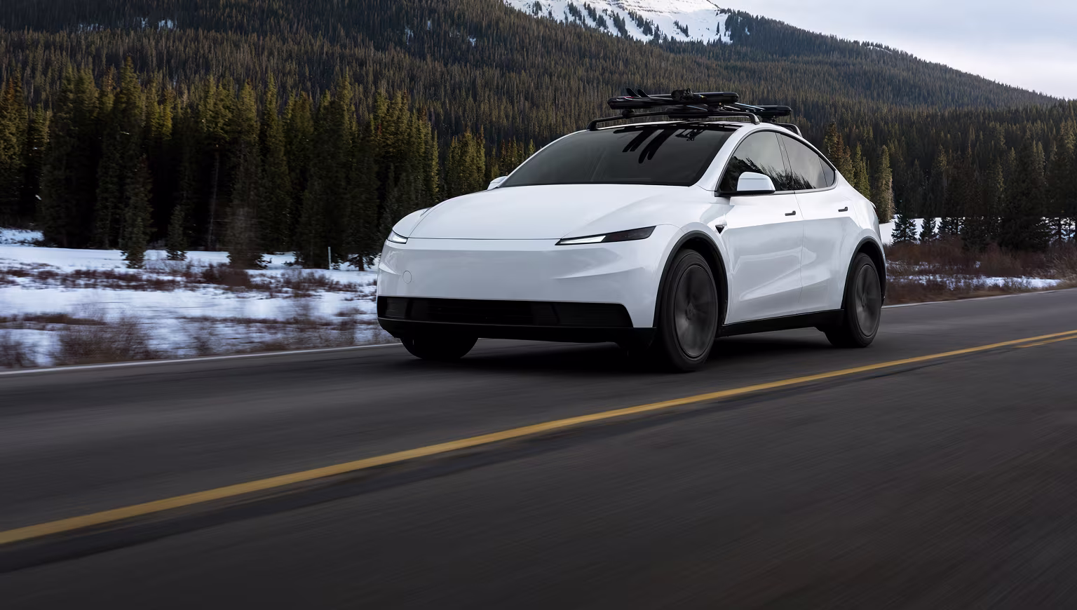 Tesla Model Y product image for model identification; rental vehicle may differ
